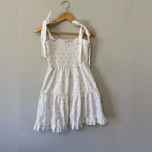 White with little blue stars dress